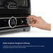 Hand setting the dial on the Val Cucina Pizza Oven: Italian-inspired design, designed to belong